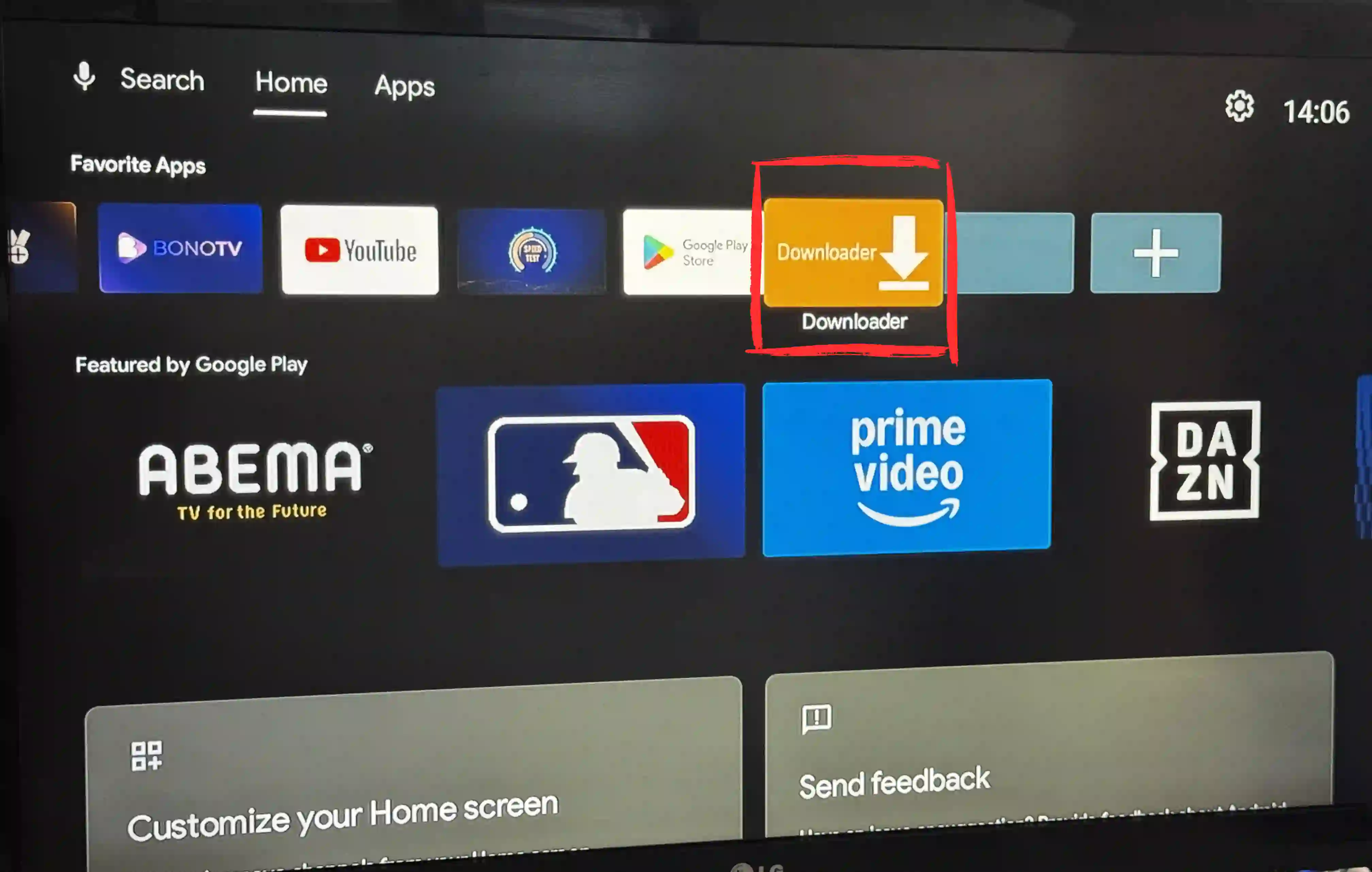 Searching the Play Store for the Downloader app by AFTVnews on an Android TV box